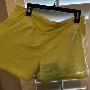 Women’s medium lime green Nike dri-fit shorts